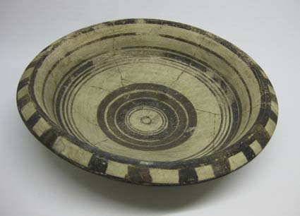 Bichrome dish repaired by A.M. Woodward © University of Leeds